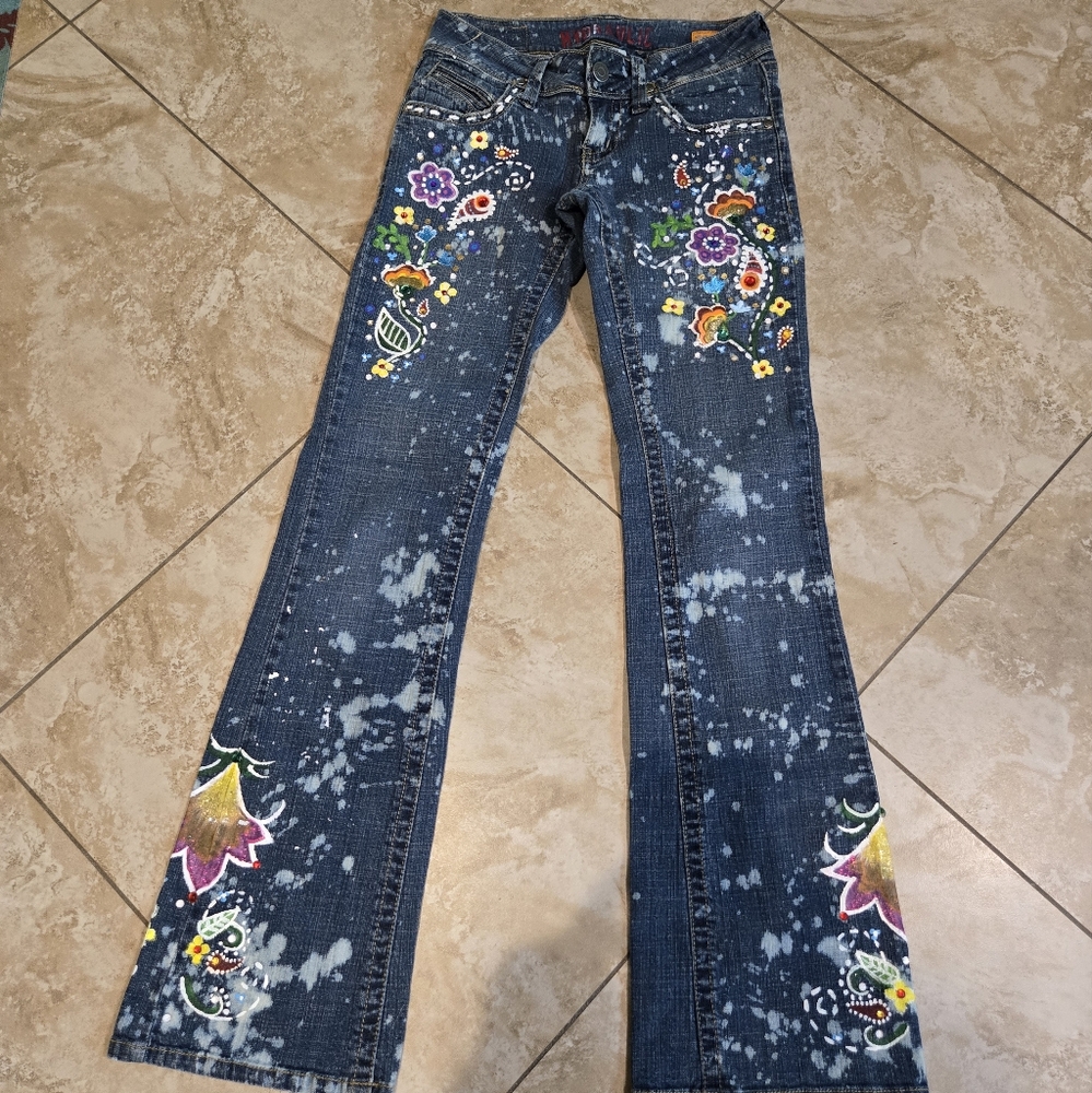 One of a kind hand painted and bejeweled floral flare jeans by Hydraulic size 1